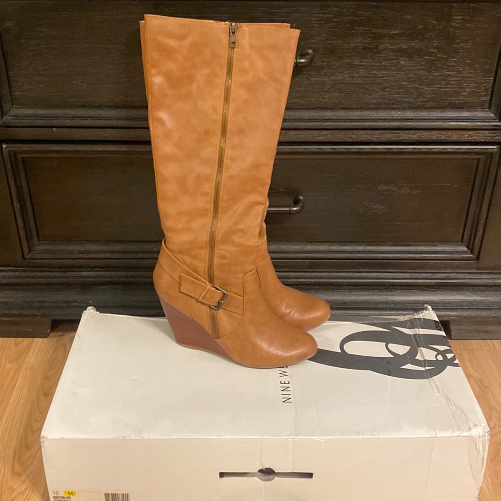 Not genuine, leather tan, wedged nine W. boot